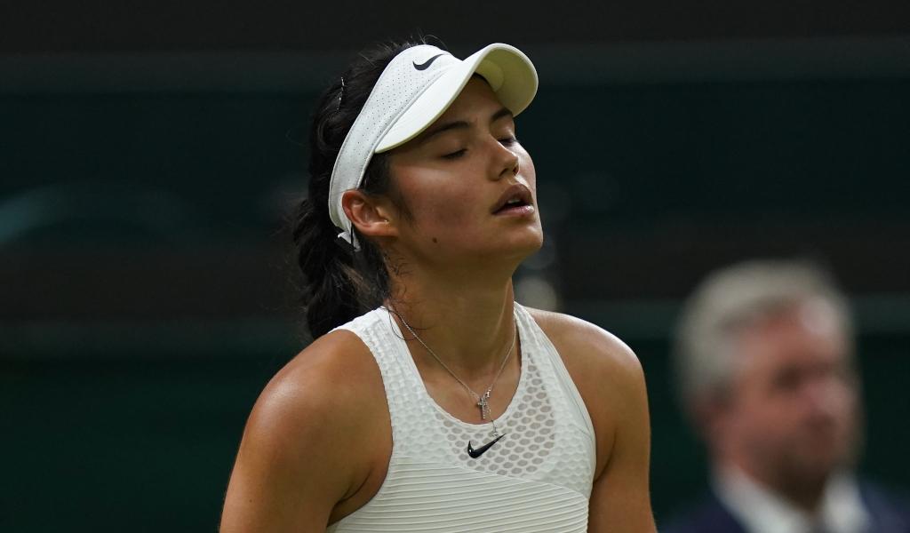 Caroline Garcia defeats Emma Raducanu at Wimbledon in 2022.