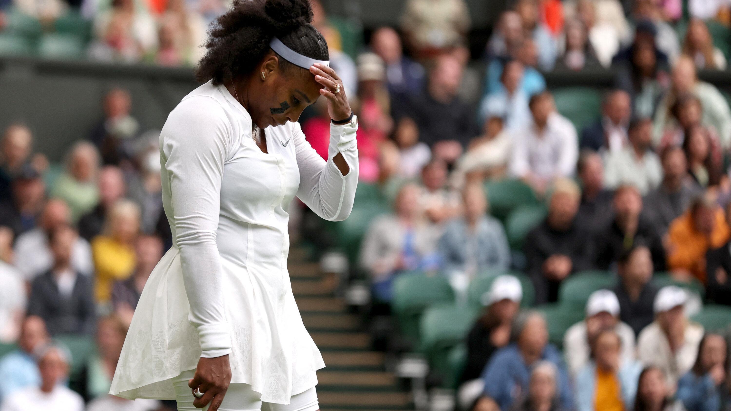 Serena Williams was beaten by Harmony Tan on her comeback to Wimbledon after a year away from the tournament.