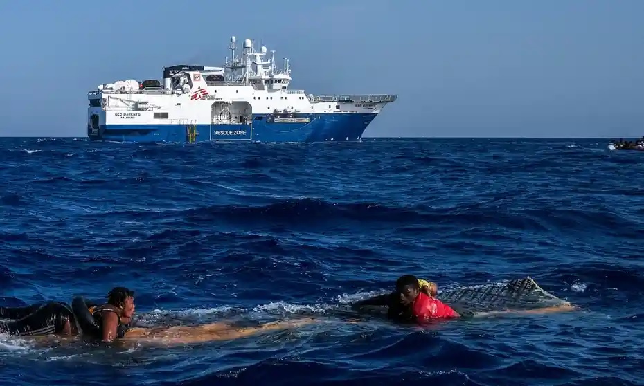 A teen boy saves infant from sinking ship in the Mediterranean