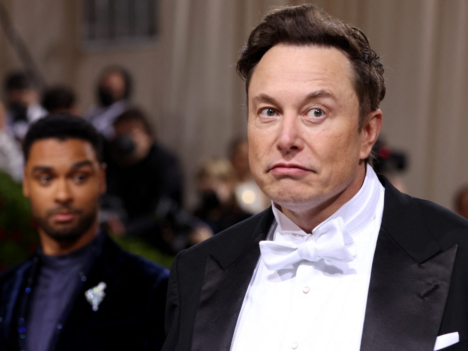 Defending himself, Elon Musk tells the former president to ‘hang up his hat.’