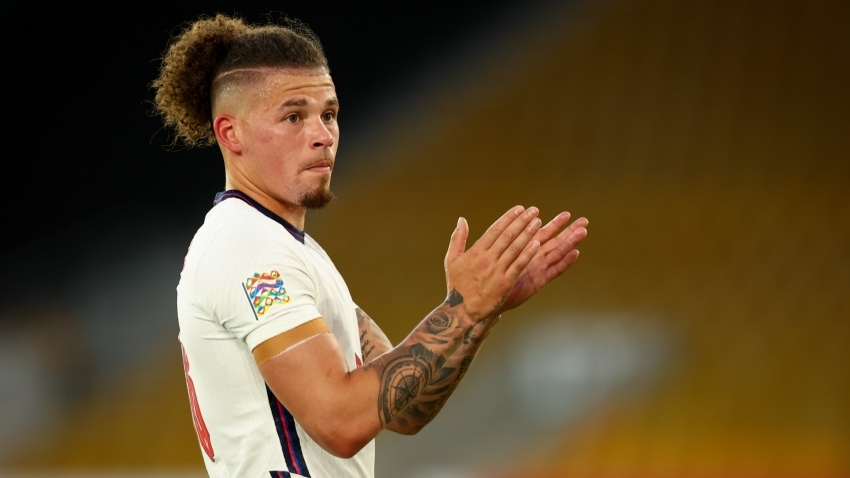 Manchester City has signed England midfielder Kalvin Phillips to a six-year contract.