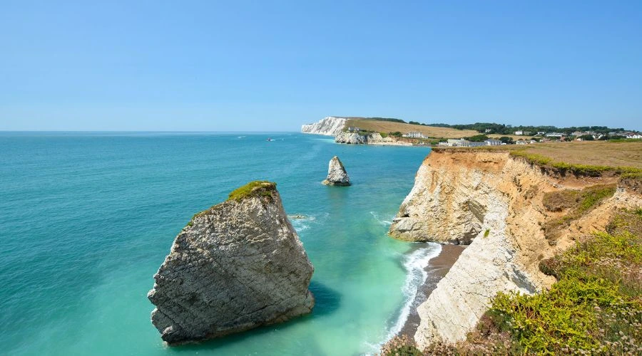 The Isle of Wight in the United Kingdom is ideal for a family vacation, with its sandy beaches, model village, and steam railway running. 