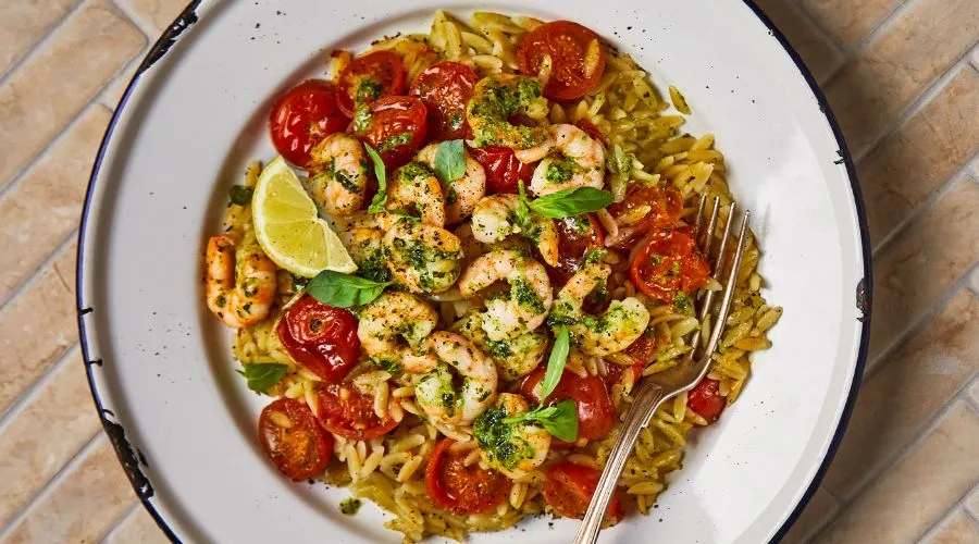 Baked orzo with harissa prawns