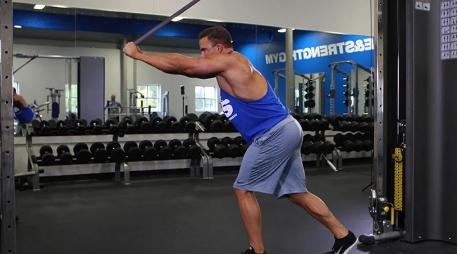 Split-Stance Overhead Banded Triceps Extension