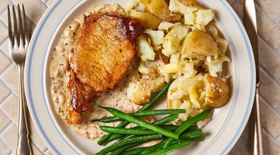 Pork Loin With Crushed Potatoes And Peppercorn Sauce