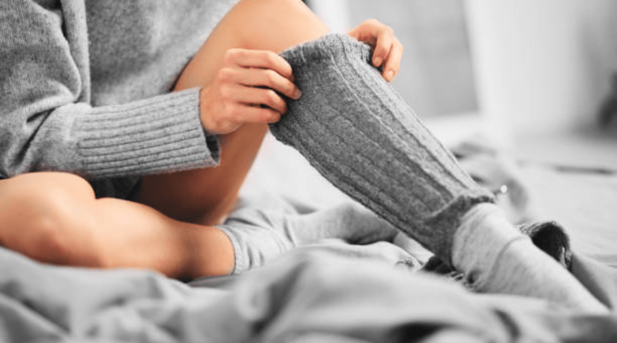 Thigh-high knitted leg warmers