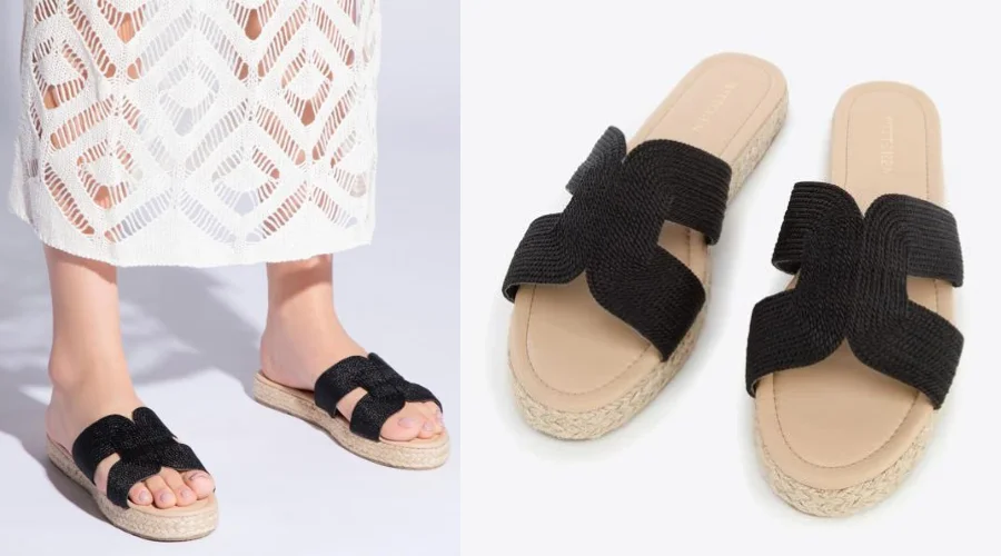Women's black flip-flops with a straw sole