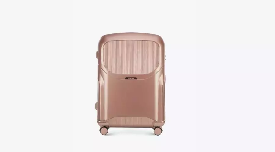 Large polycarbonate suitcase with a rose gold, dusty pink zipper